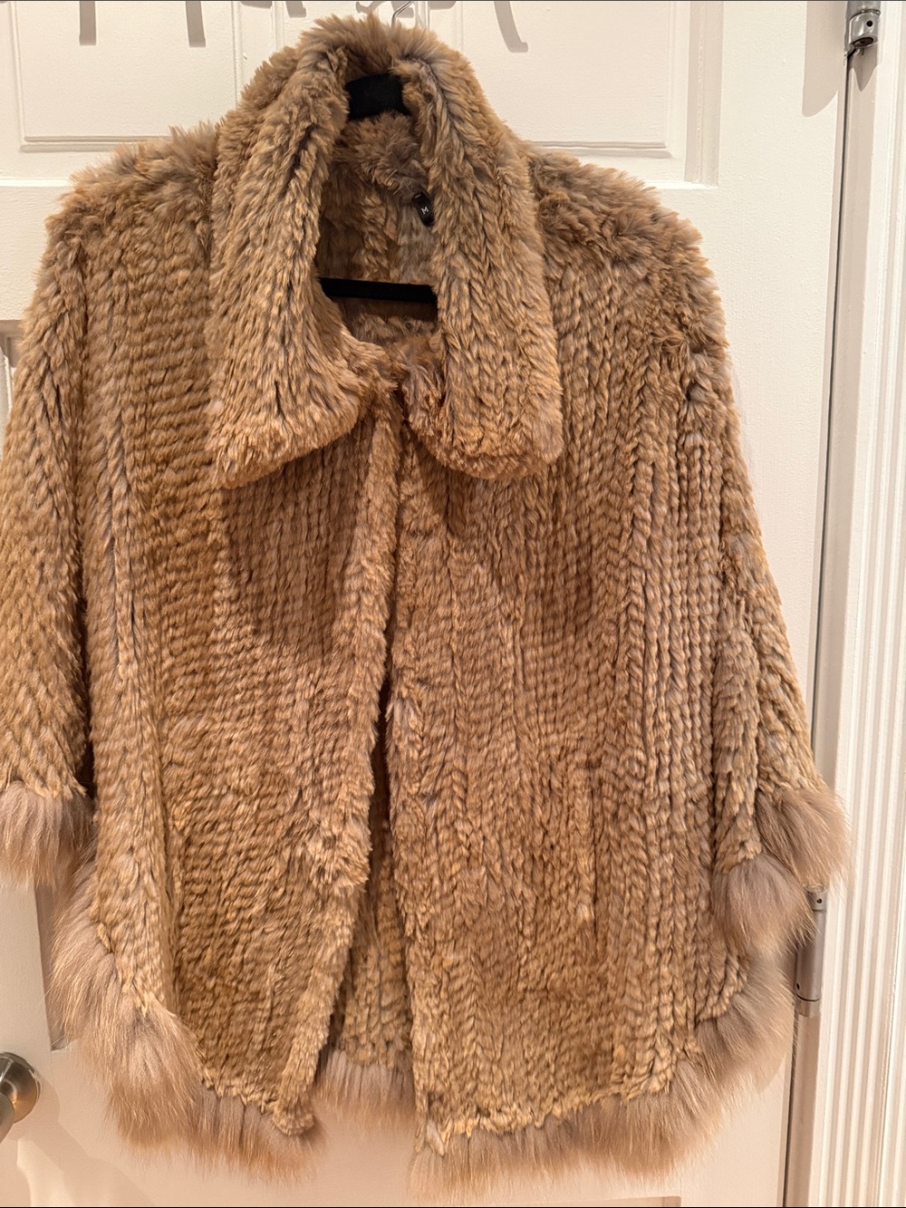 Sheared Rabbit Poncho with pockets.